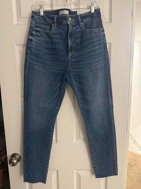 LOFT Women's Curvy Skinny Jeans with frayed cuff  in Medium Blue Wash